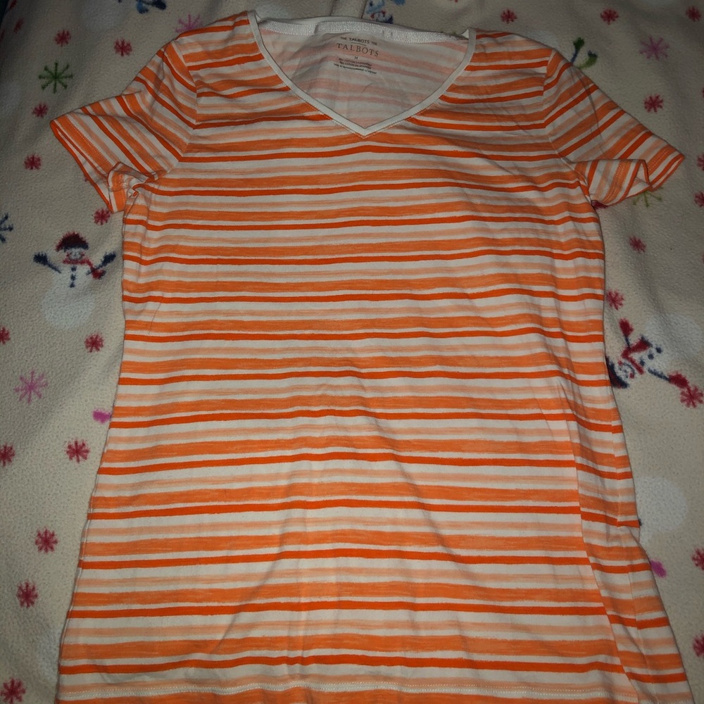 A orange and white top❤️